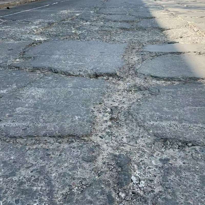 泰来路面起砂露石子修补料